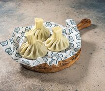 Хинкали с курицей в сливочном соусе