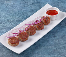 Шашлык из мясных рулетиков