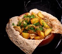 Картофель бейби, жаренный с грибами
