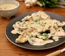 Escalope de veau à la crème et champignons de Paris
