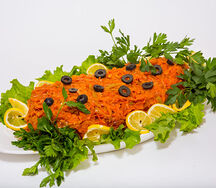 Рыба под овощами