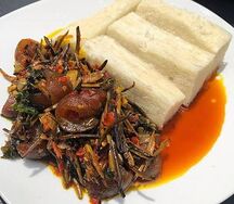 Boiled yam and ugba sauce and dried fish n pkomo