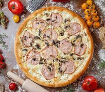 Пицца с ветчиной и грибами
