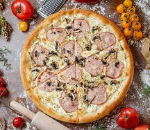 Пицца с ветчиной и грибами