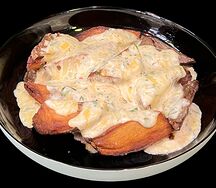 Картофель по-деревенски под сырной шапкой