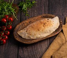 Кальцоне ветчина-сыр