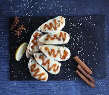 Запеченные мидии в ракушках под фирменным соусом