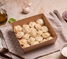 Пельмени с курицей и свининой со специями