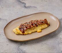 Омлет с подкопченным сомом