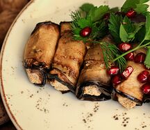 Рулетики из баклажанов с начинкой из пряной ореховой пасты