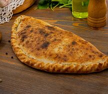 Кальцоне с ветчиной и сыром