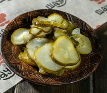 Огурец маринованный