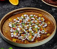 Карпаччо из осьминога с апельсиновым соусом