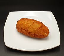 Котлета по-киевски со сливочным маслом и зеленью