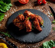Крылья куриные в соусе спайси