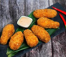 Крылышки острые в панировке