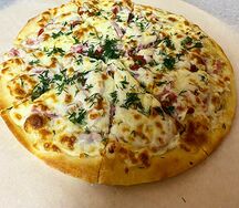 Пицца с ветчиной и грибами