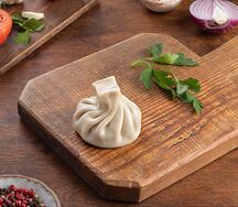 Хинкали с бараниной и зеленью