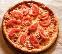 Пицца с говядиной