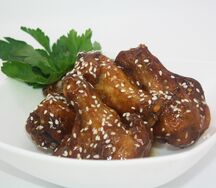 Куриные крылья в кисло-сладком соусе