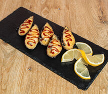 Мидии в сырном соусе