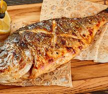 Рыба дорадо на мангале