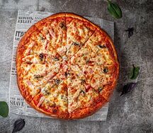 Пицца с ветчиной и грибами