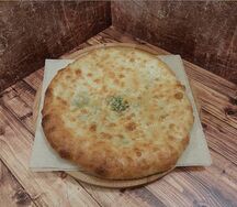 Осетинский пирог с сыром и зеленью