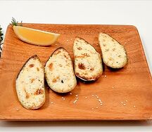 Мидии запеченные в чесночном соусе