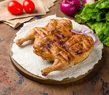 Курица табака на углях