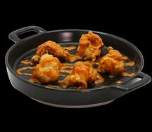 Креветки в кляре с соусом том ям