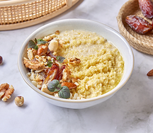 Каша пшенная на миндальном молоке с орехами и финиками