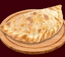 Кальцоне с ветчиной и грибами