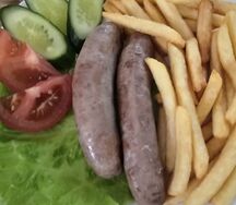 Колбаски жареные
