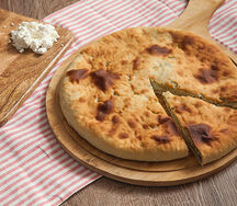 Осетинский пирог с творогом и зеленью