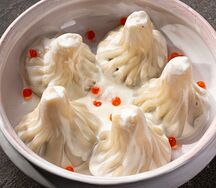 Хинкали с картофелем и грибами в сливочном соусе чкмерули