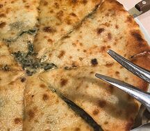 Осетинский пирог с сыром и зеленью