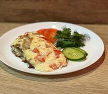 Судак, запечённый с овощами