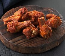 Куриные крылышки острые в панировке