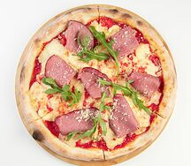 Пицца с копченым мясом