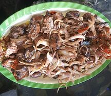 Choukouya de porc du chef avec attieke