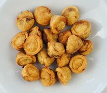Пельмени жареные с говядиной