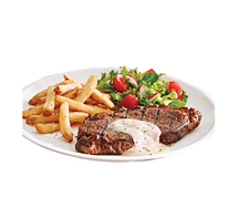 Steak de viande à la crème fraîche et aux champignons