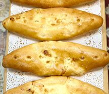 Осетинский пирожок с яйцом и зеленью