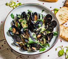 Мидии в сливочном соусе