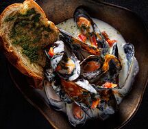 Мидии в томатном соусе