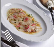Севиче из сибаса с маринованным луком