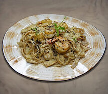 Аришта с морепродуктами в сливочном соусе