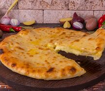 Осетинский пирог с сыром и картофелем Картофджин