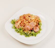 Капуста, жаренная с сосисками 